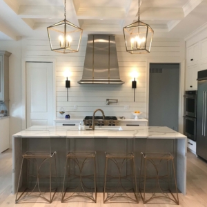 MetalCraft custom metal fabrication stainless bell range hood with light aged brass