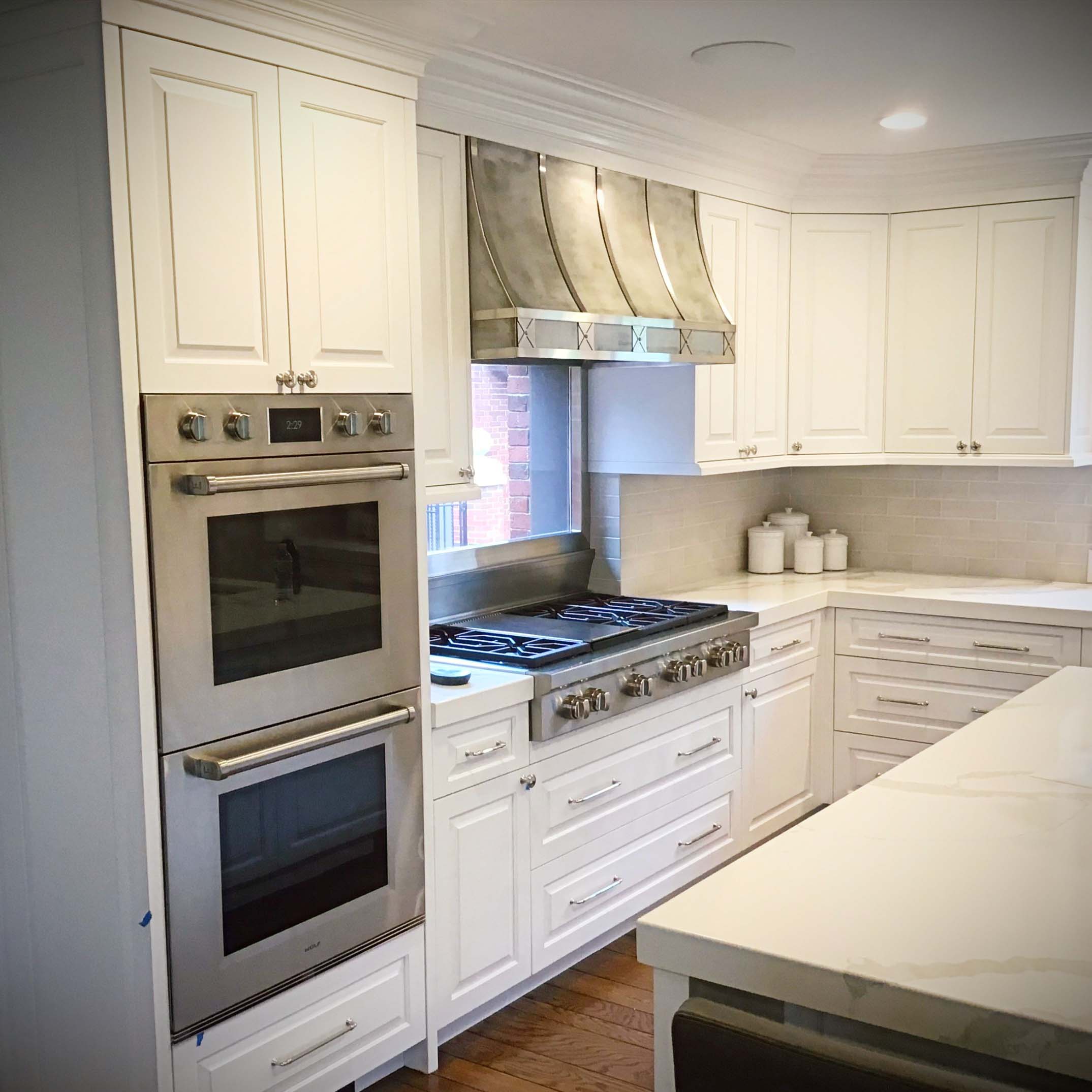 MetalCraft Custom Aluminum "X" Range Hood and Stainless Window Surround