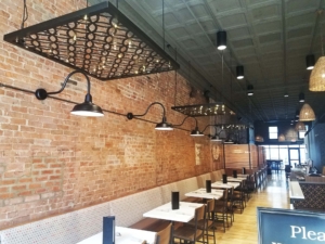 MetalCraft Custom Hanging Metal Panels Over Lights