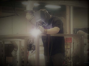 Here's the shop manager Mike jumping in to get the job done. Sometimes we have to chain him to the desk, but this is where he wants to be.
