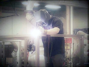 Here's the shop manager Mike jumping in to get the job done. Sometimes we have to chain him to the desk, but this is where he wants to be.