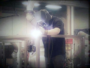 Here's the shop manager Mike jumping in to get the job done. Sometimes we have to chain him to the desk, but this is where he wants to be.